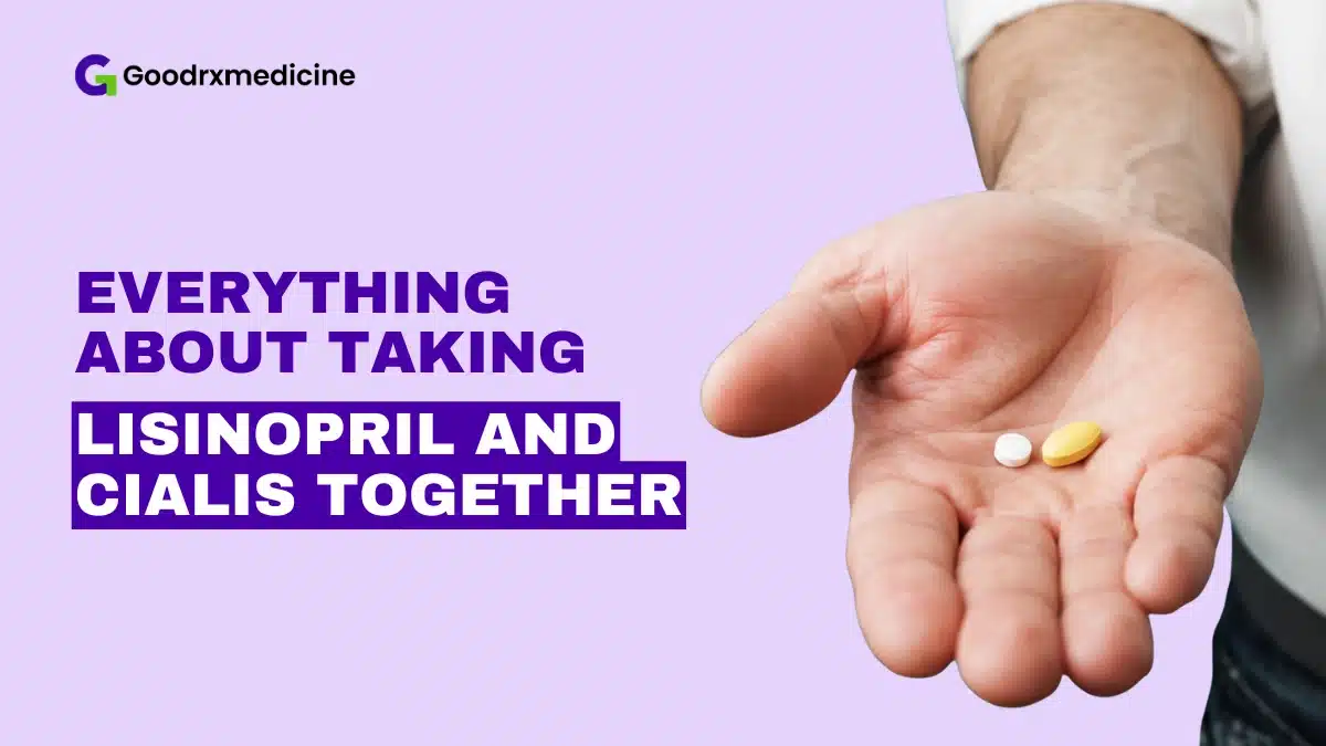 Hand holding two pills