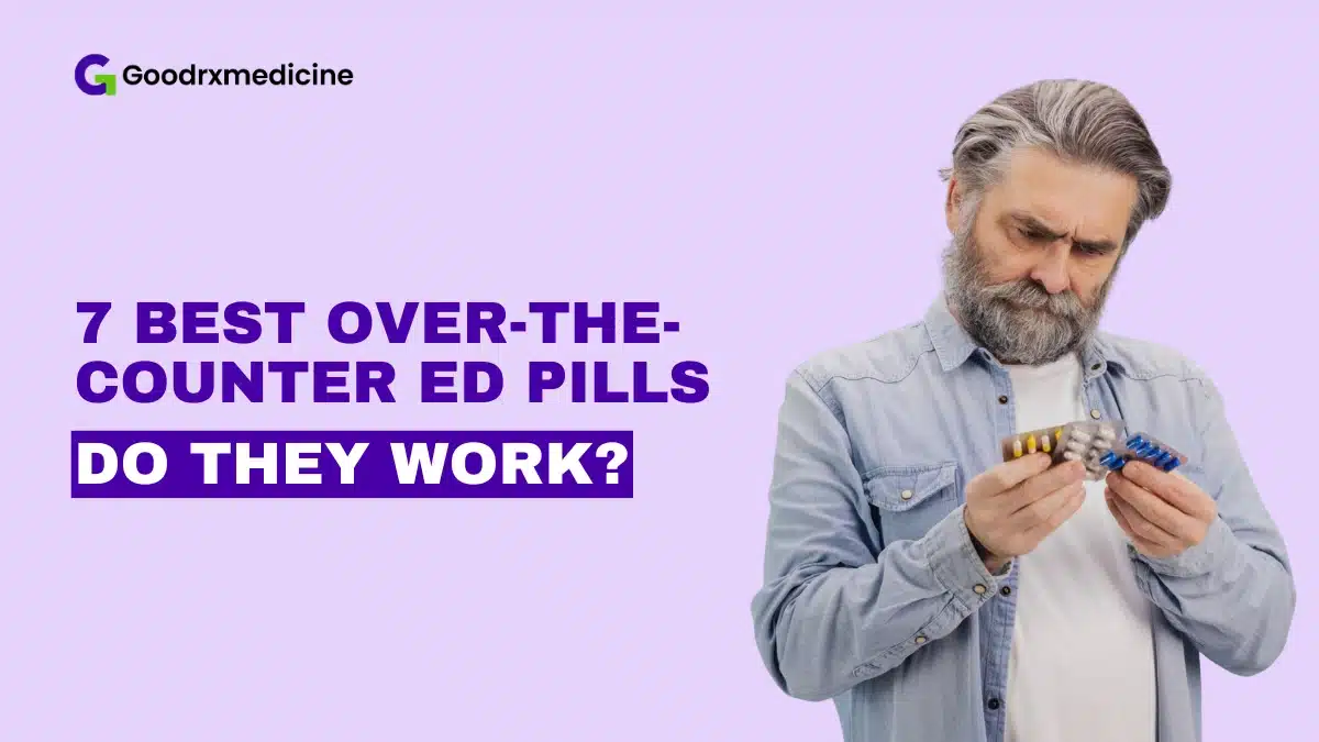 Older man looking at blister packs of medication
