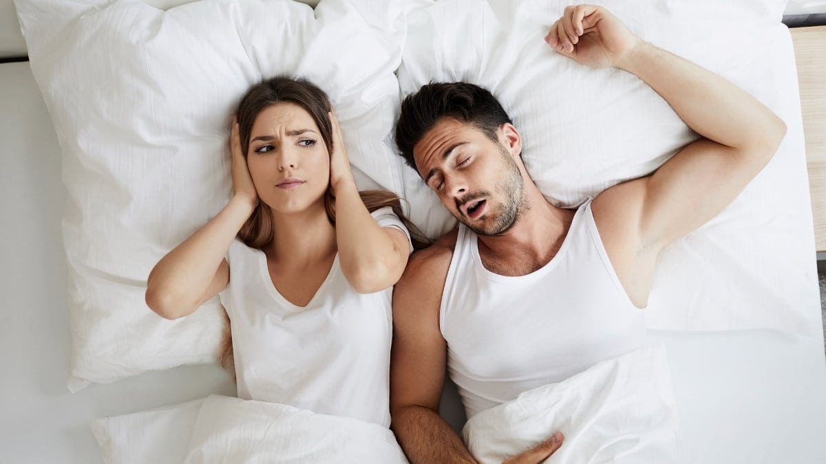 Woman unable to sleep due to snoring man