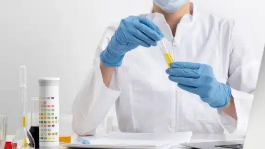 Healthcare professional analyzing a sample for a drug test.