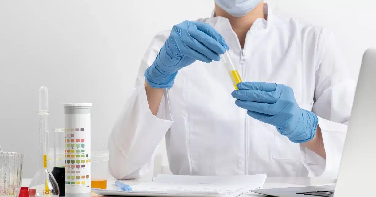 Healthcare professional analyzing a sample for a drug test.
