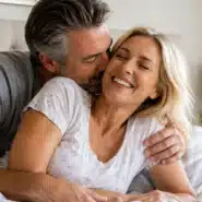 Mature couple enjoying intimacy and affection after menopause