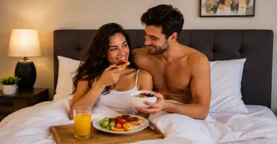 Couple eating fruit after sex due to increased hunger