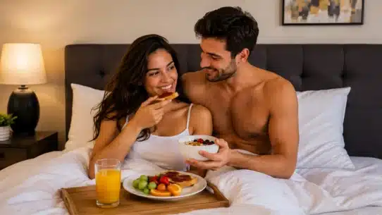 Couple eating fruit after sex due to increased hunger